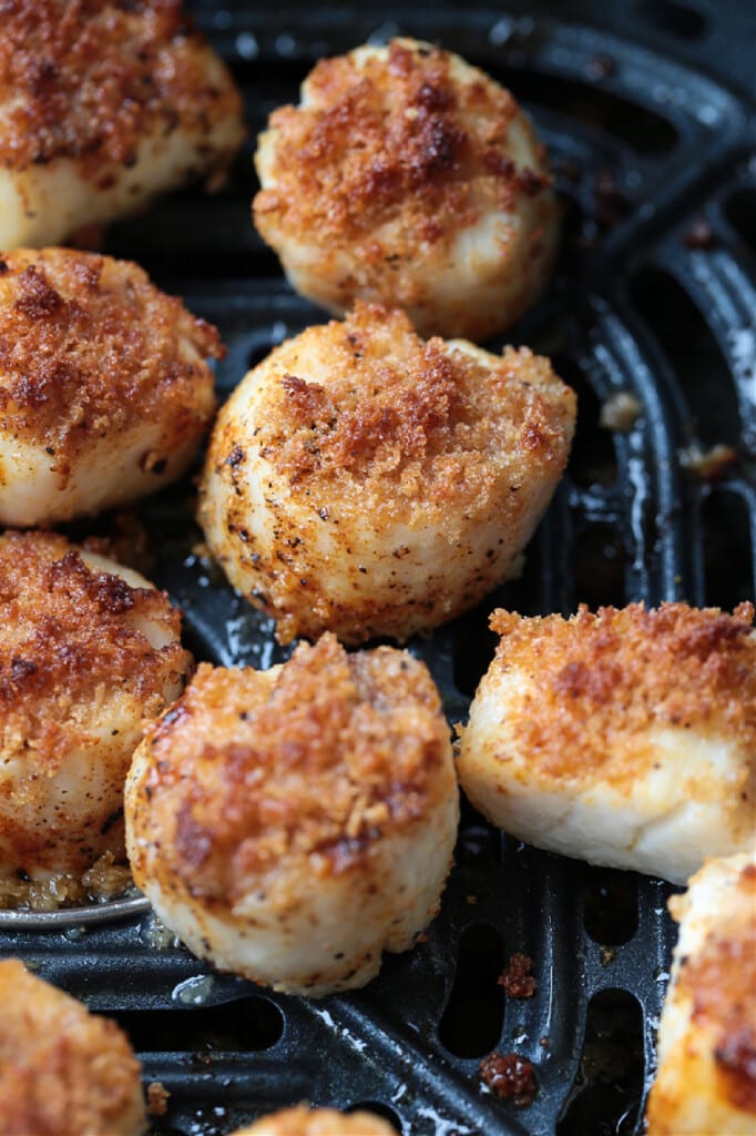These Air Fryer Scallops are perfectly cooked and are melt in your mouth tender. An easy seafood dinner recipe for any occasion! panko crusted scallops in an air fryer