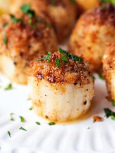 scallop with breadcrumb topping drizzled with butter