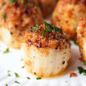 scallop with breadcrumb topping drizzled with butter