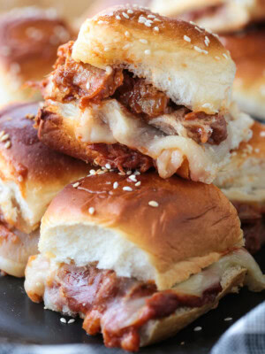 bbq pulled pork sliders stacked on plate