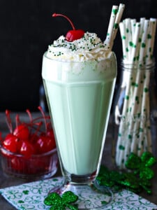 shamrock shake with whipped cream and sprinkles