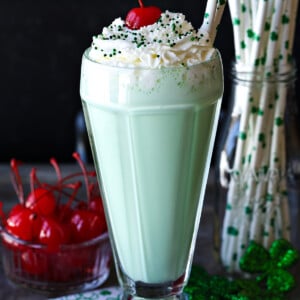shamrock shake with whipped cream and sprinkles