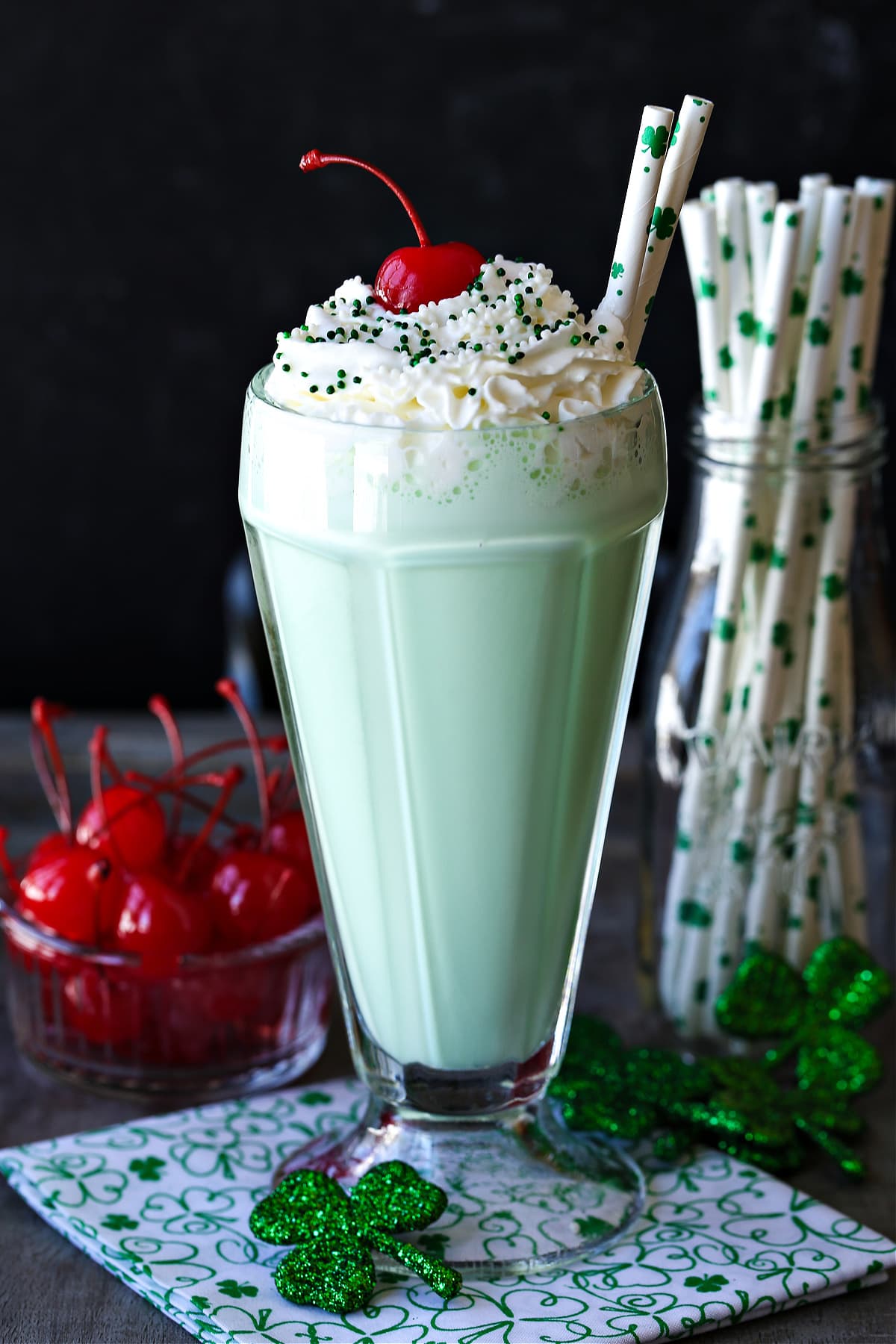 shamrock shake with whipped cream and sprinkles