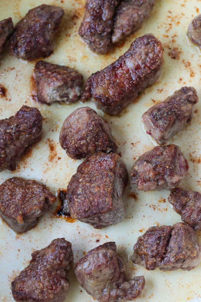 seared beef tips in a pot