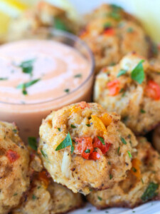 crab balls with peppers on a plate