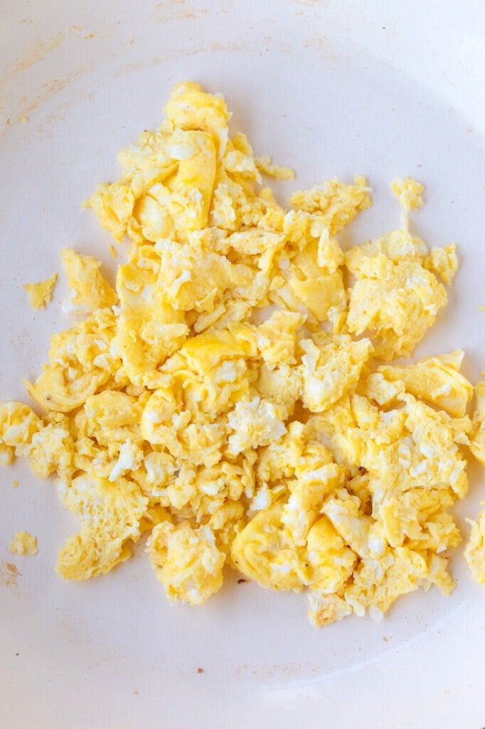 Shrimp Fried Rice is a classic Asian dish that's easy to make at home! A fun and healthy dinner that can be customized to your liking! scrambled eggs in a skillet