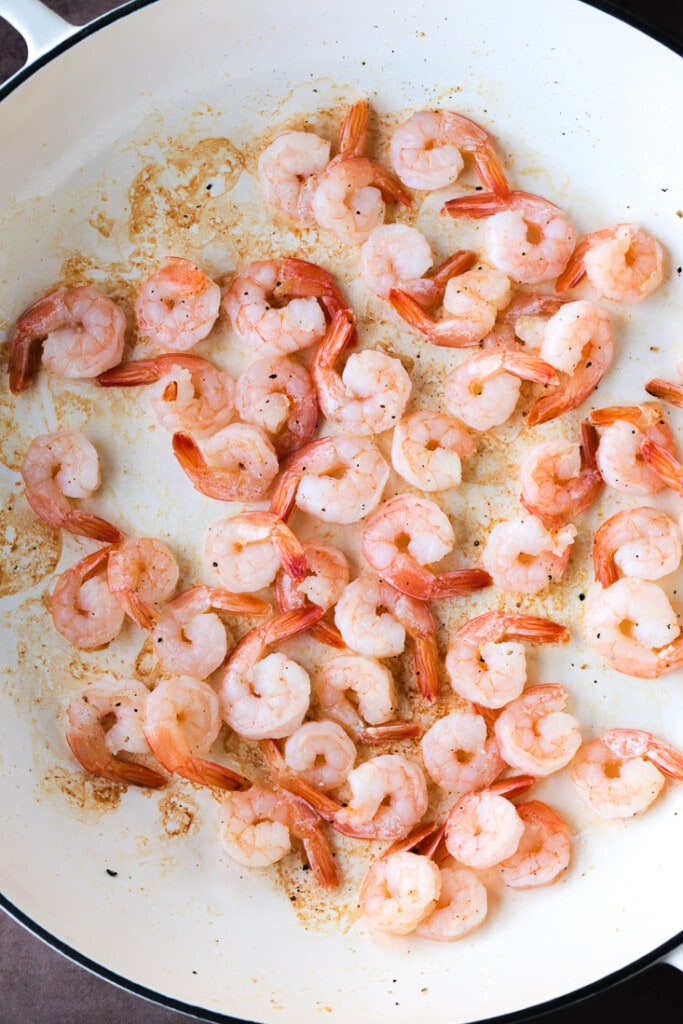 Shrimp Fried Rice is a classic Asian dish that's easy to make at home! A fun and healthy dinner that can be customized to your liking! baby shrimp in a skillet