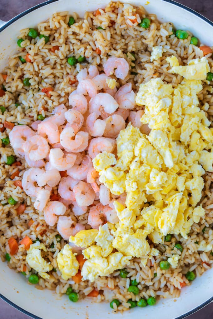 Shrimp Fried Rice is a classic Asian dish that's easy to make at home! A fun and healthy dinner that can be customized to your liking! ingredients for shrimp fried rice in a skillet