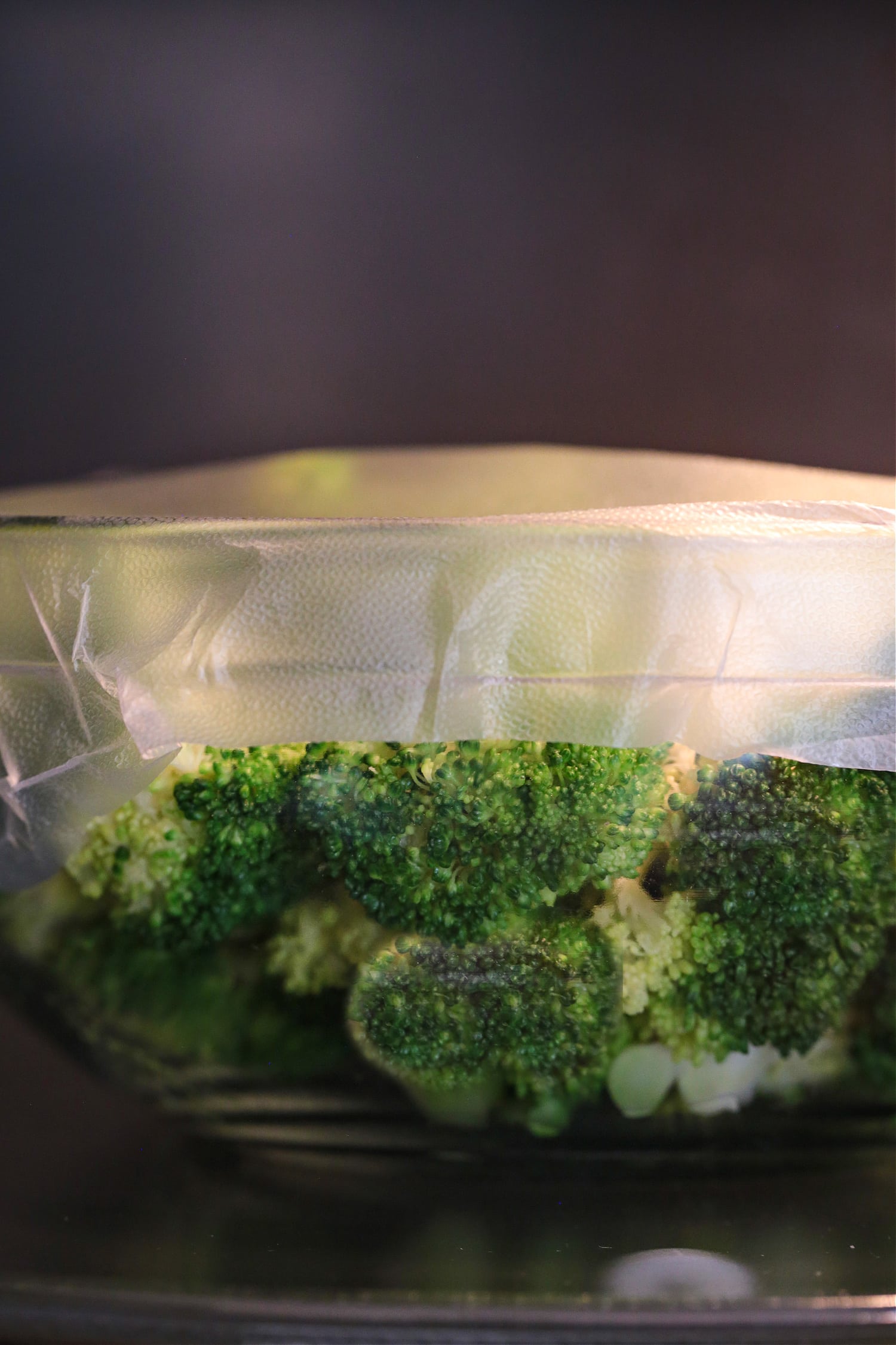 broccoli florets in a bowl in the microwave