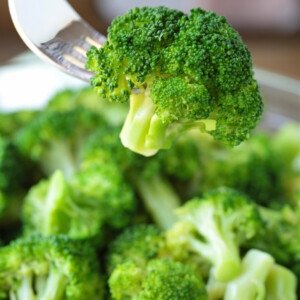 steamed broccoli floret on fork