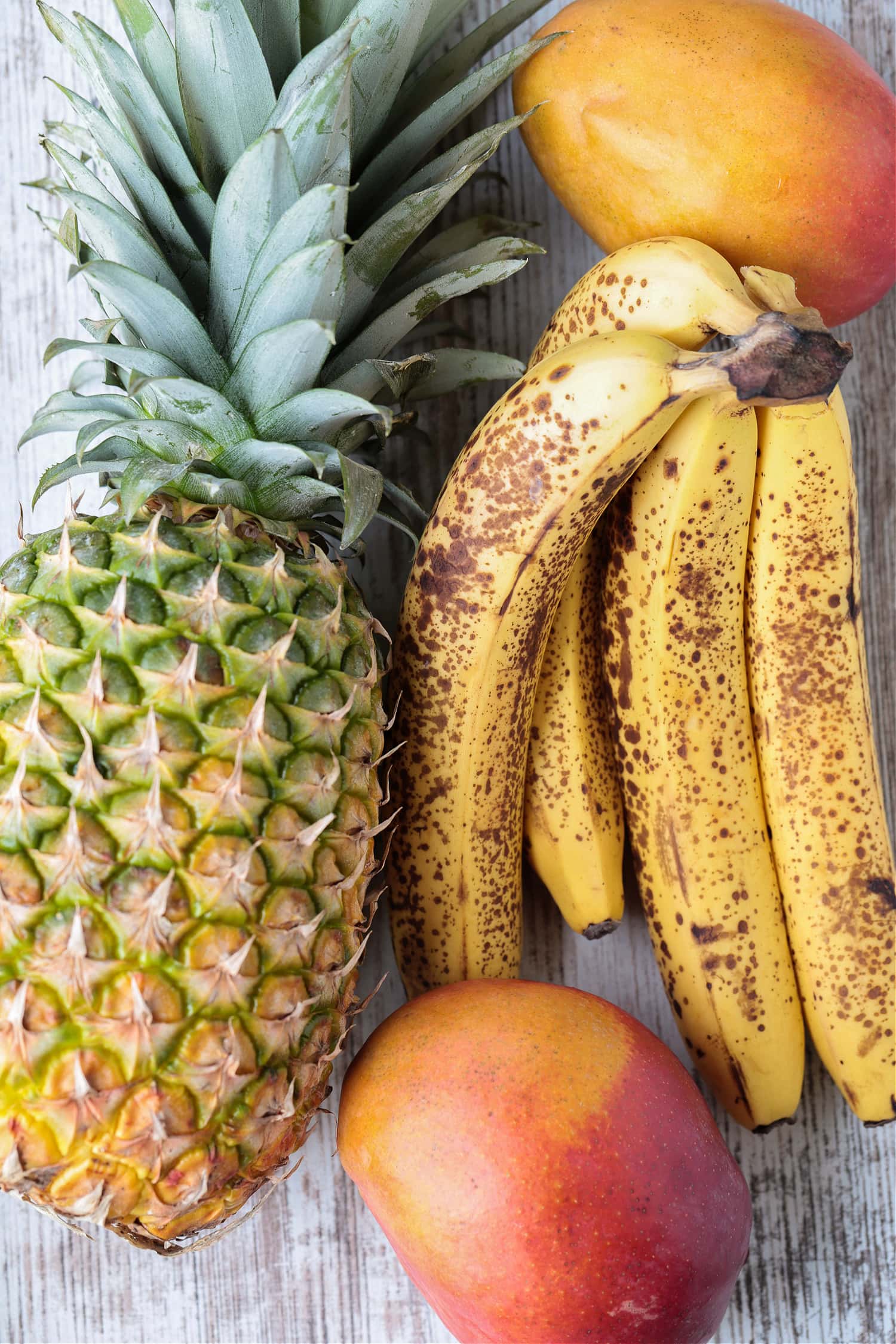 ingredients for making mango pineapple smoothie