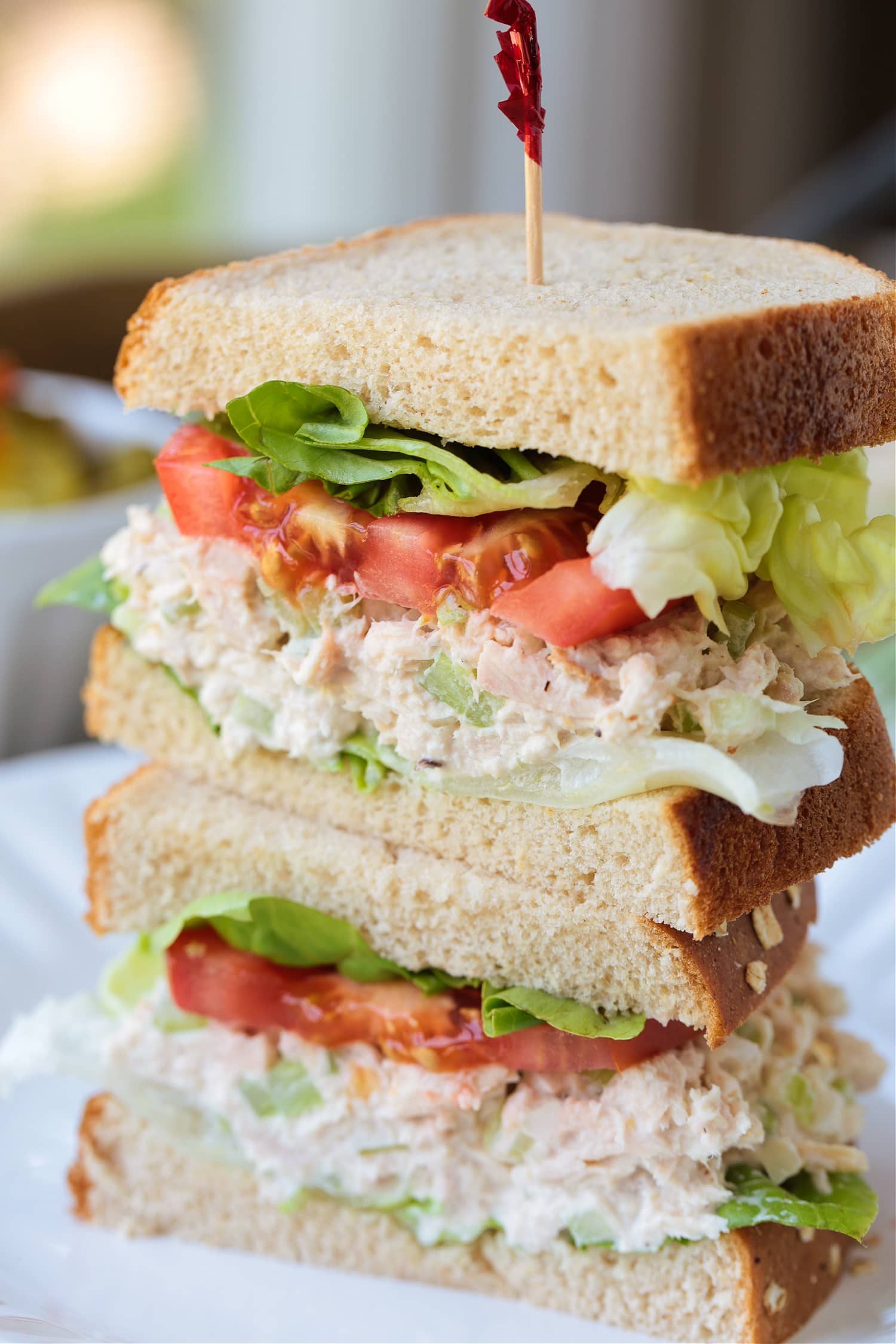 tuna salad sandwich sliced and stacked