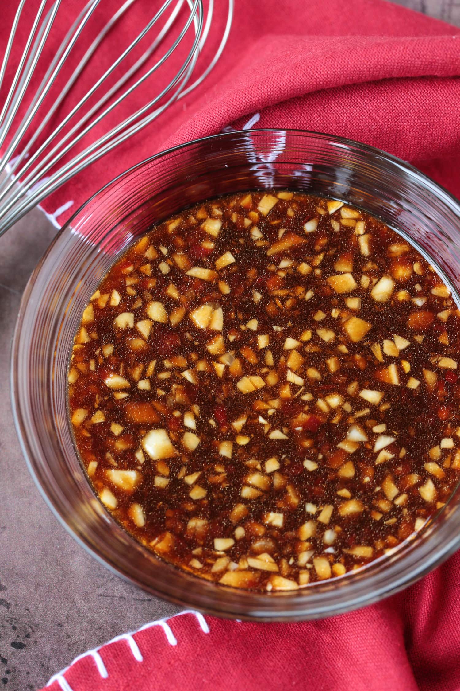 asian chicken marinade in bowl with whisk