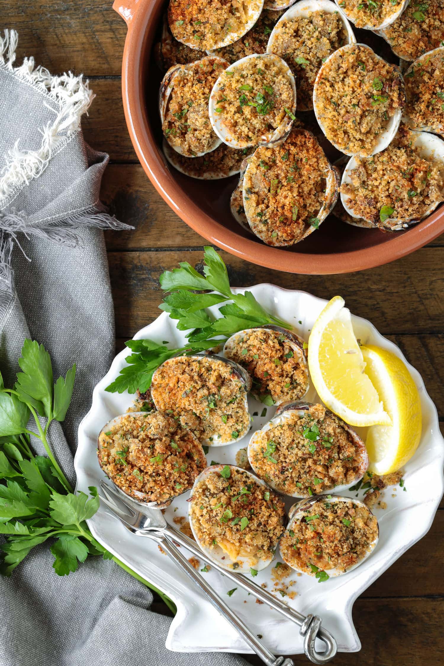 baked clams in shell dish with clams on the side