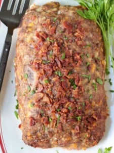 bacon meatloaf on platter with fork