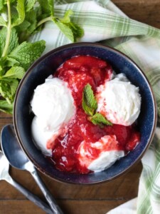 ice cream in a bowl with homemade strawberry compote