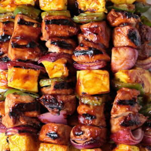 chicken and pineapple kabobs in platter