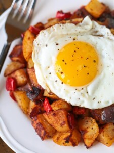 fried egg on top of breakfast potatoes