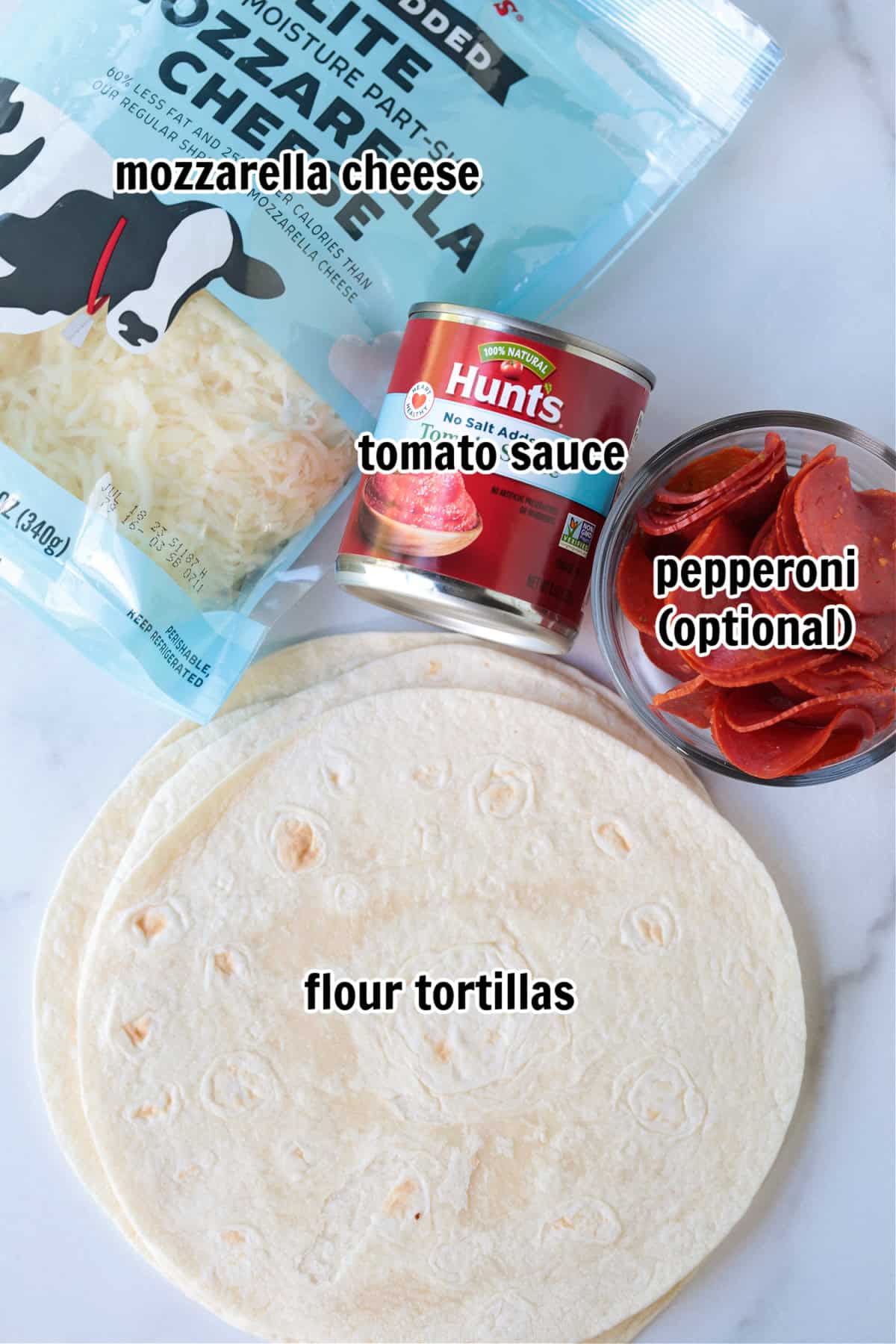 An Air Fryer Tortilla Pizza is perfect for an after school snack or an easy meal! A thin, crispy crust with gooey cheese ready in minutes! ingredients for making tortilla pizza