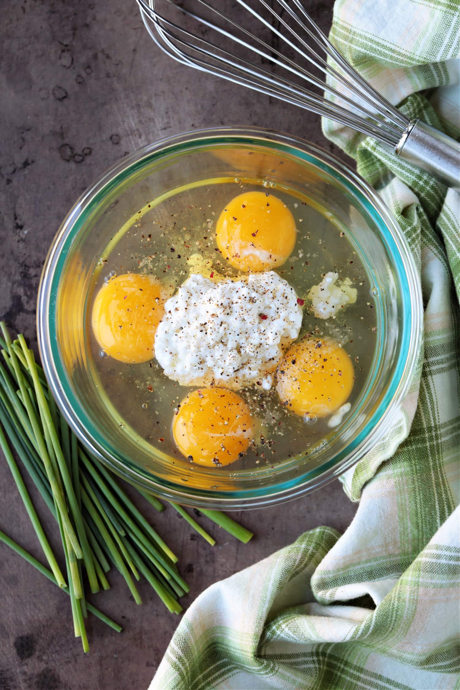 eggs and cottage cheese in a bowl with napkin