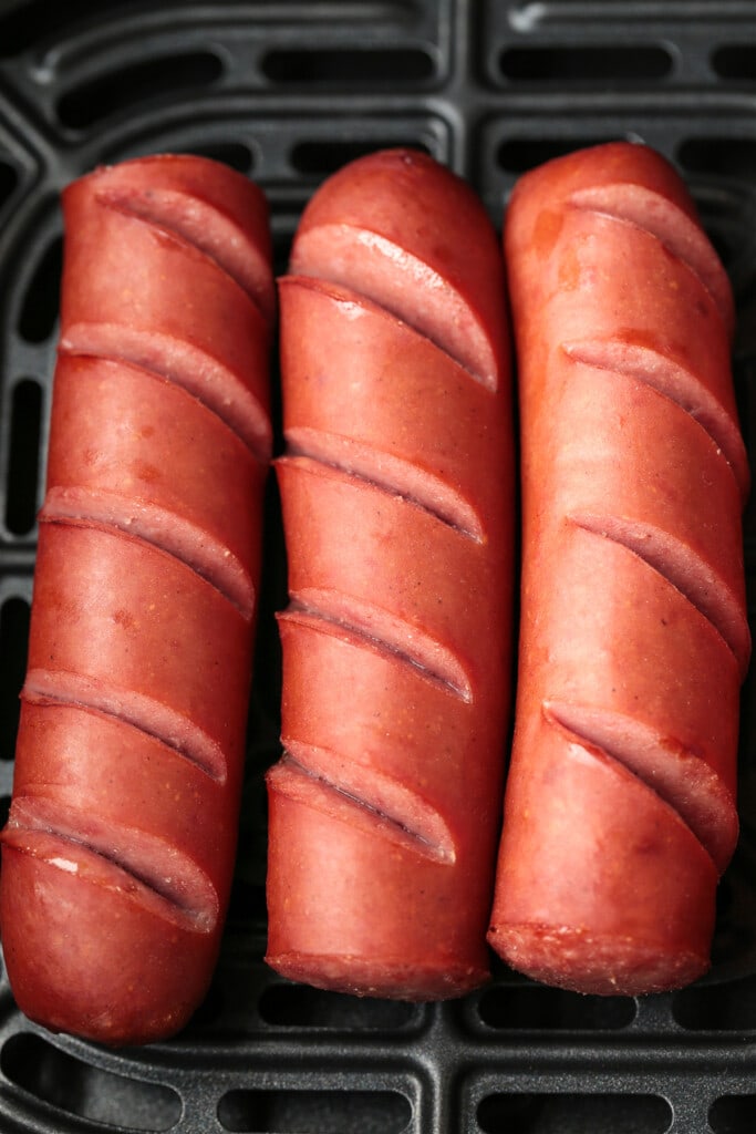 Air Fryer Kielbasa turns out crispy on the outside and super juicy on the inside! Just two ingredients and less than 10 minutes to make! kielbasa cooked in an air fryer
