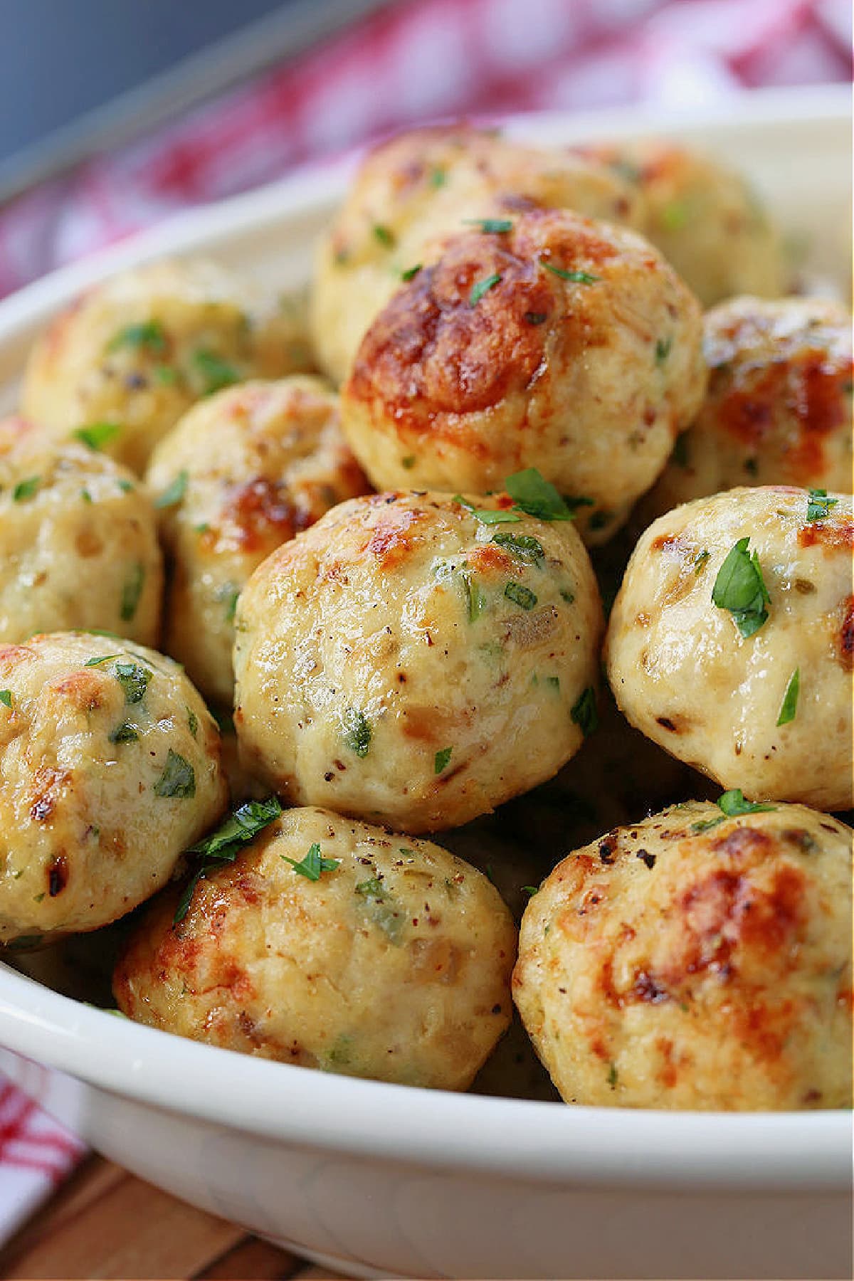 chicken meatballs in a white bowl