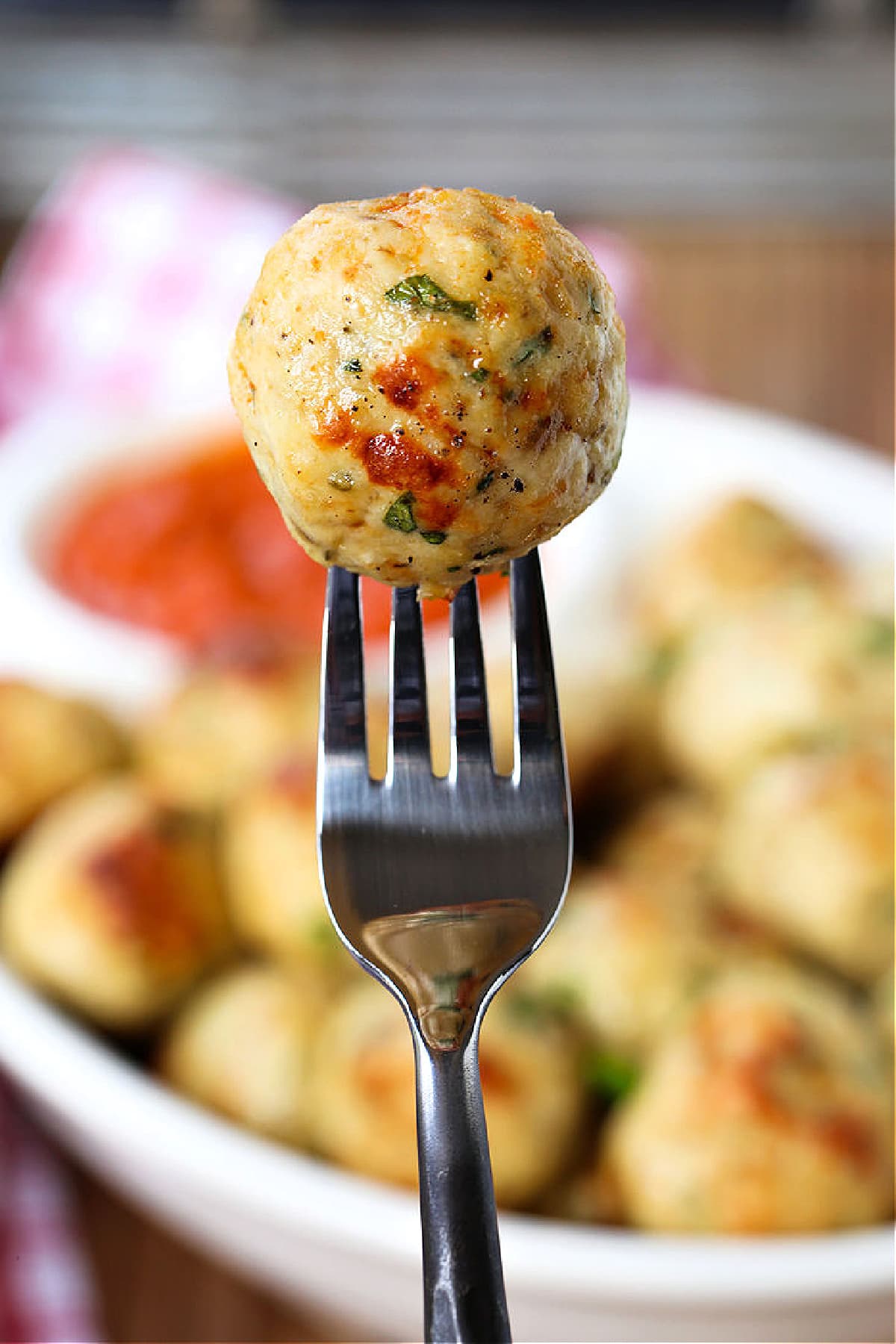 chicken meatball on a fork