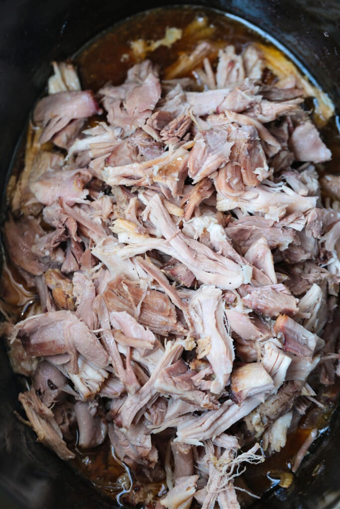 shredded pulled pork in slow cooker