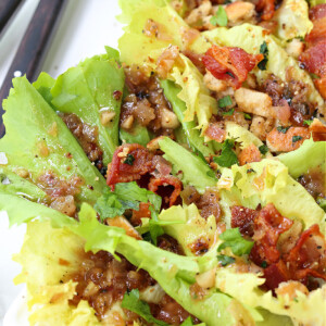 escarole salad shown close up from the corner of a platter
