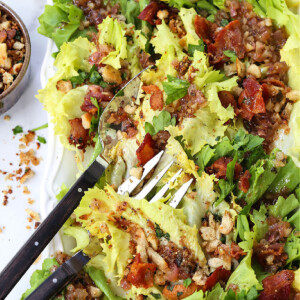 escarole salad with bacon and breadcrumbs on platter