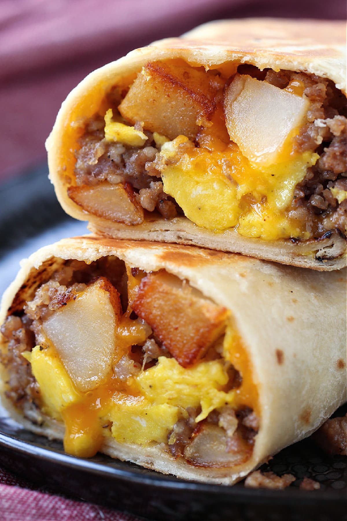breakfast burritos cut in half and stacked