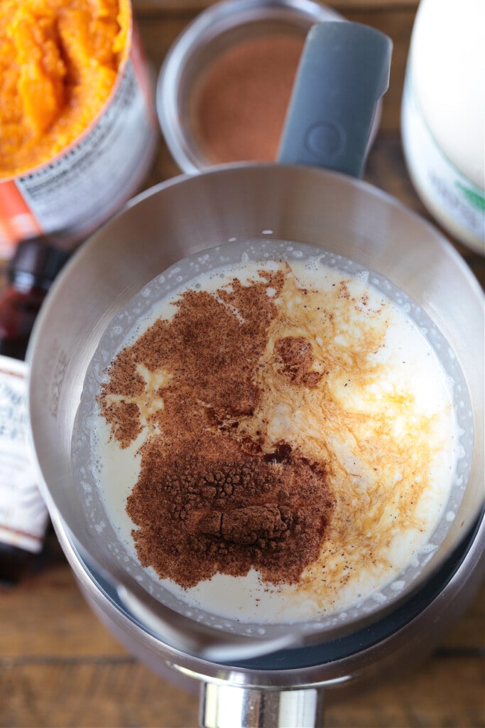 Elevate your coffee at home with homemade Pumpkin Cream Cold Brew! Even better than ordering out, made with real pumpkin and warm spices! cream in a frother with pumpkin and pumpkin spice