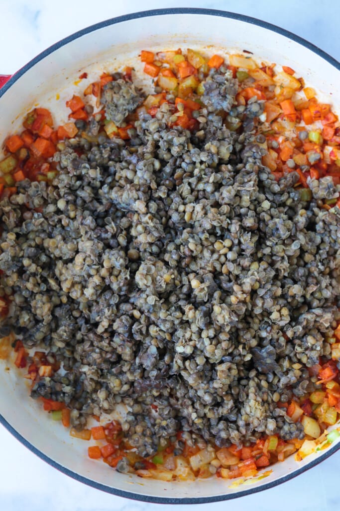 lentils and vegetables in soup pot