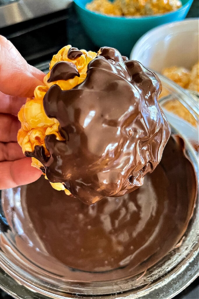 Popcorn ball dipped in chocolate