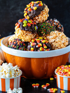 popcorn ball decorated in Halloween candy