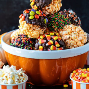 popcorn ball decorated in Halloween candy