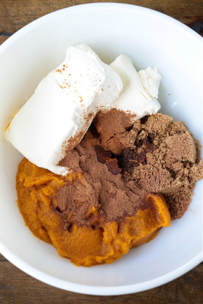 ingredients in a bowl for pumpkin pie filling