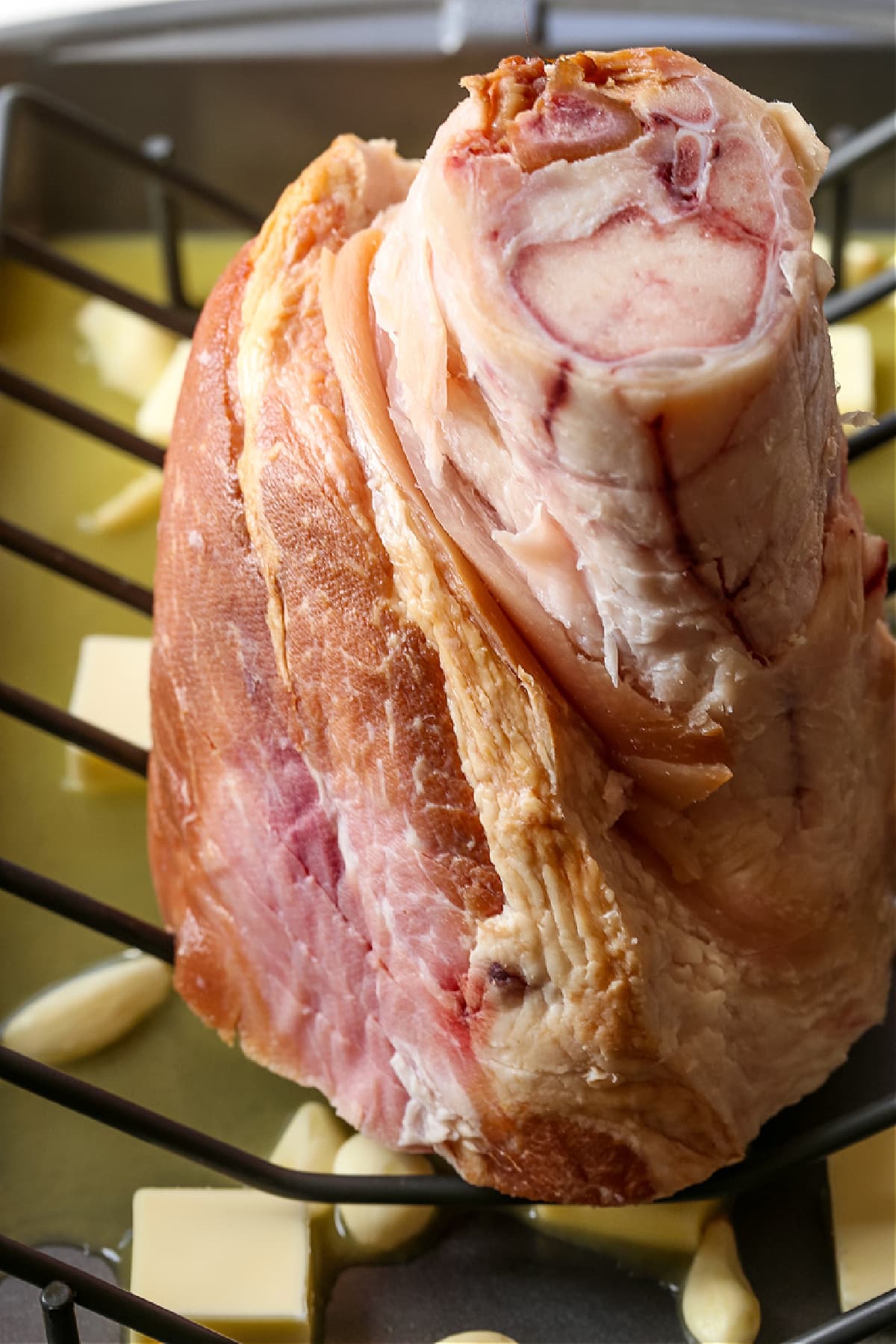 ham on rack before going in the oven