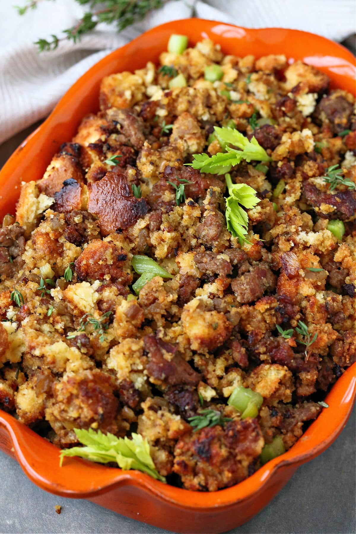 sausage cornbread dressing in baking dish on an angle