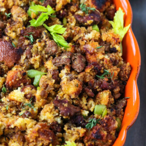 sausage cornbread dressing in orange baking dish