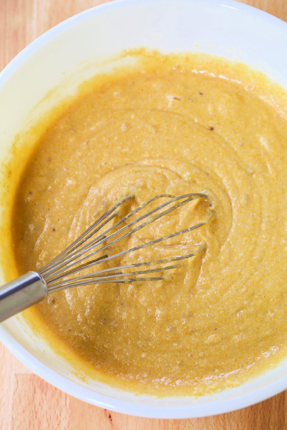 batter in white bowl for cornbread