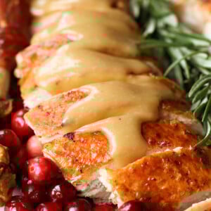 gravy on top of sliced turkey breast