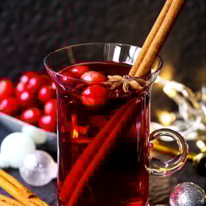 slow cooker punch in glass mug with garnish