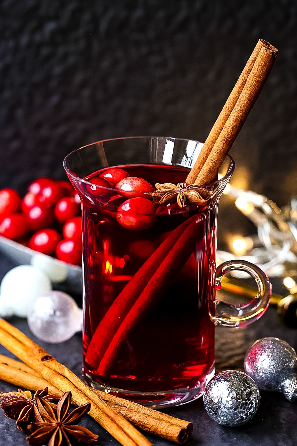 slow cooker punch in glass mug with garnish