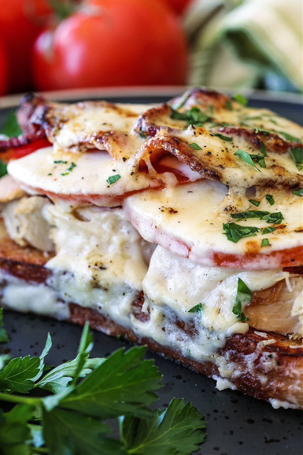 kentucky hot brown sandwich on plate with Mornay sauce
