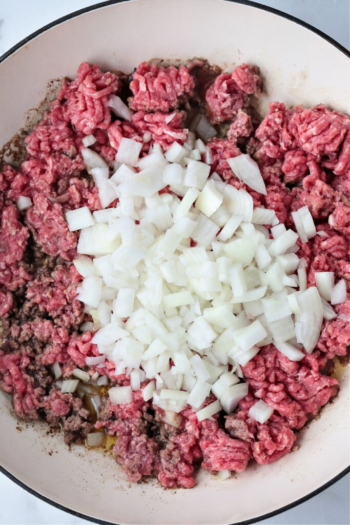 ground beef and onions in skillet