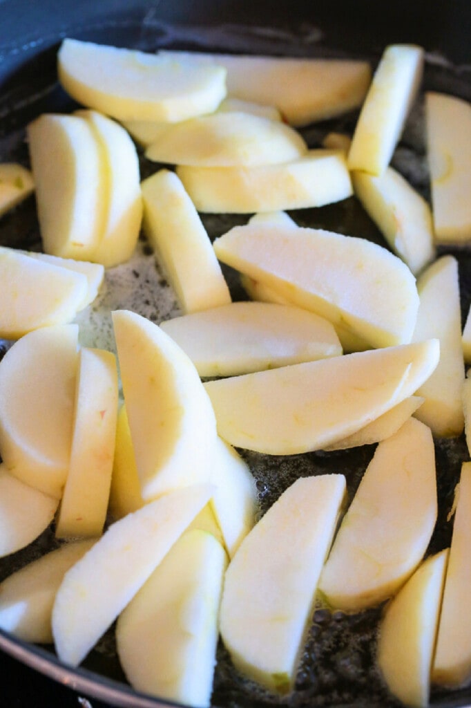 apple slices in skillet with butter