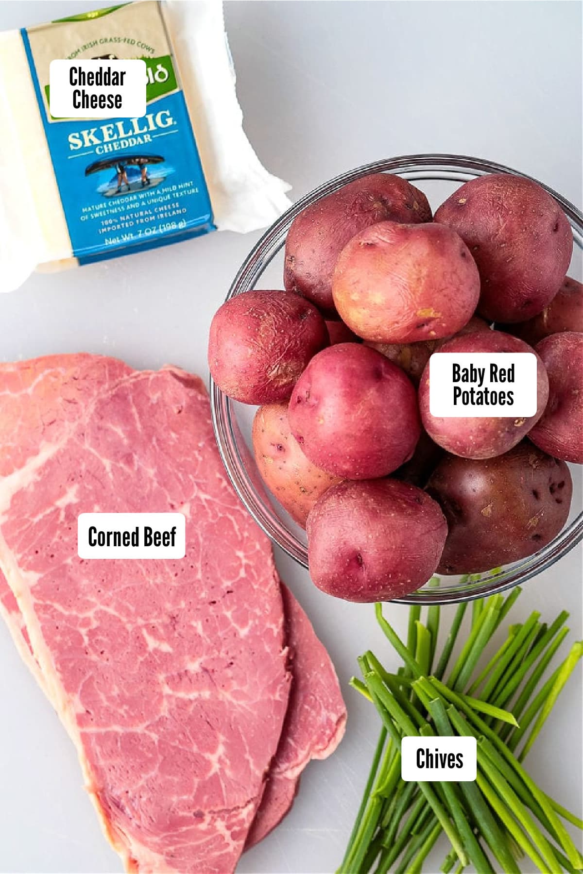 Corned Beef Stuffed Potatoes are a tasty way to use leftover corned beef! Tender baby potatoes stuffed with corned beef and cheddar cheese! ingredients for making stuffed potatoes with corned beef and cheese