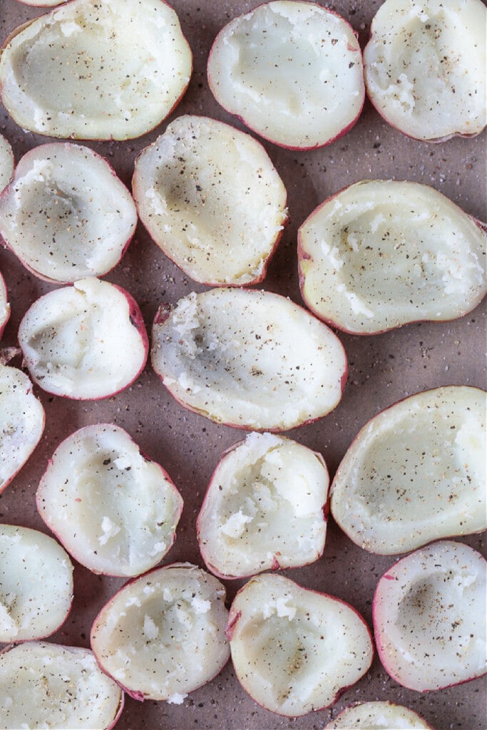 Corned Beef Stuffed Potatoes are a tasty way to use leftover corned beef! Tender baby potatoes stuffed with corned beef and cheddar cheese! cooked red potatoes with flesh scooped out