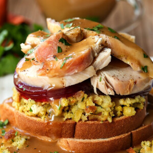 turkey sandwich with stuffing, cranberry sauce and gravy